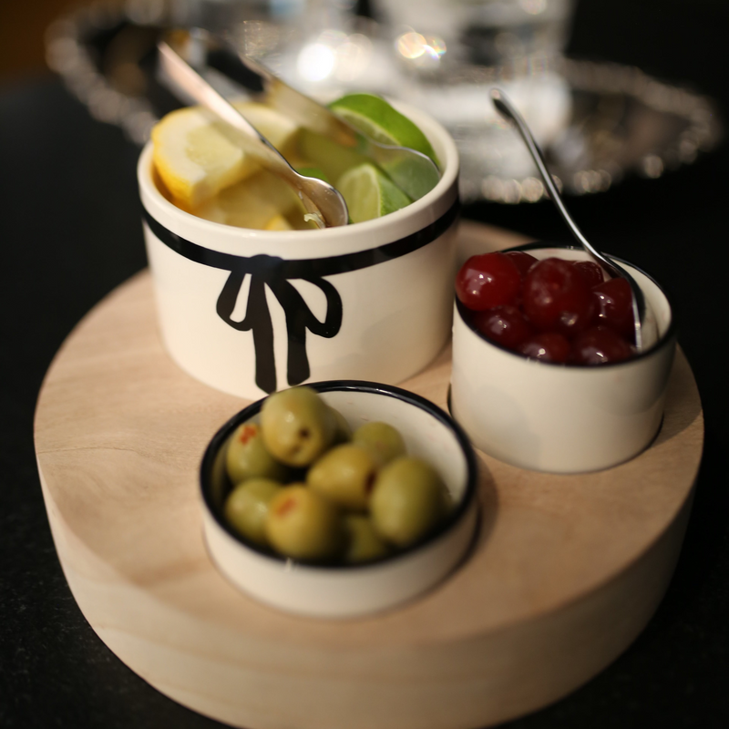 Three Bowls with a Wooden Base