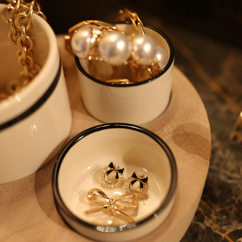 Three Bowls with a Wooden Base