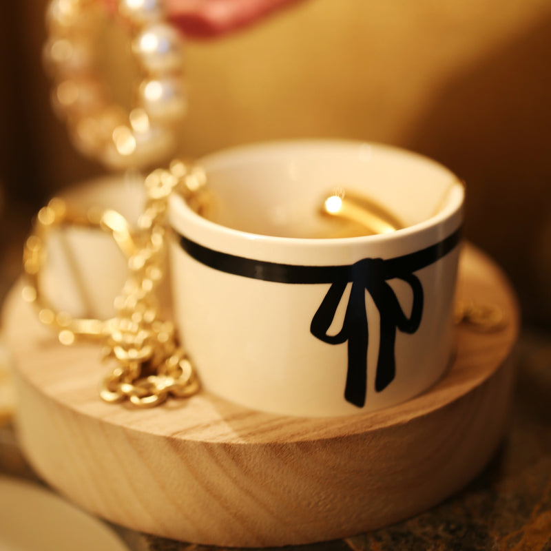 Three Bowls with a Wooden Base