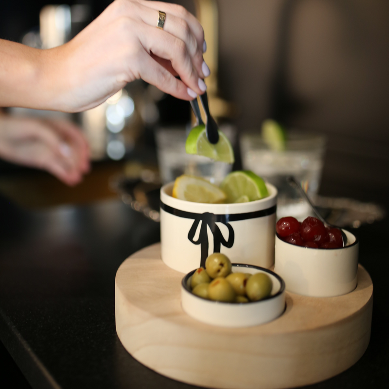 Three Bowls with a Wooden Base